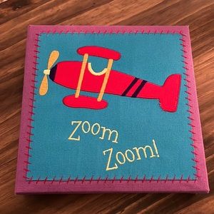 Zoom Zoom airplane sign for baby or child’s room. Good condition. 9x9 inches.